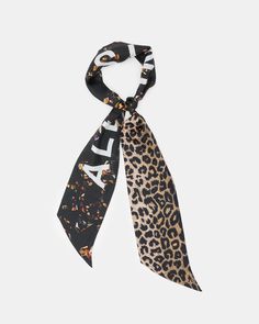 A scarf can bring a look together. The Kateri is a skinny shape with leopard print on one side and florals on the other. It's crafted from silk and printed with our signature logo - this luxury piece can be styled on your neck, as a tie, on your head or tied to your bag. This is versatility on a whole new level.  Skinny shape Silk fabrication AllSaints signature logo Floral and leopard print Multiple use scarf Logo Floral, Scarf Outfit, Sweater Sale, Sweaters And Jeans, Jeans For Sale, Shirt Sale, All Saints, Signature Logo, Your Head