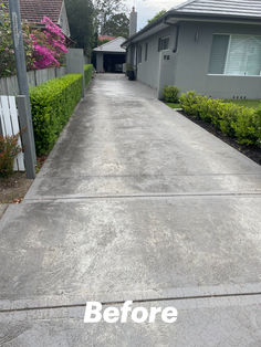 a driveway that has been cleaned and is in the process of being paved with concrete