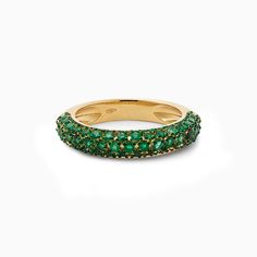 Adorned with a dazzling array of green emeralds, this contemporary and voluminous ring brings a generous amount of shimmer to your attire. Discover the perfect blend of luxury and charm with our bubble ring collection. Stack it alongside any of our additional bubble rings, offered in a spectrum of seven vibrant color choices. Material: 18kt Gold & Natural Emeralds Carats: 1 cts Color: Available in 18kt Yellow Gold Length: n/a Size: All ring sizes available Closure: n/a Green Cluster Luxury Ring, Luxury Cluster Emerald Ring, Luxury Green Diamond Ring With Pave Setting, Green Cluster Rings With Brilliant Cut, Green Emerald Cluster Ring With Brilliant Cut, Green Cluster Diamond Ring Fine Jewelry, Luxury Green Half Eternity Ring, Fine Jewelry Green Ring With Pave Setting, Green Rings With Pave Setting In Fine Jewelry Style