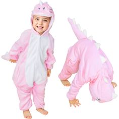 a child in a pink dinosaur costume standing next to an adult one piece onesuit