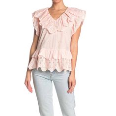 Flirty Ruffles Trim This Fresh Eyelet Blouse That Is Sure To Get Compliments Everywhere. Fit: This Style Fits True To Size. Fiber Content100% Cottonmaterials100% Cottoncaredry Clean Onlyadditional Info- V-Neck - Short Flutter Sleeves - Slips On Over Head - Eyelet Construction - Ruffle Trim - Approx. 26" Length - Imported Spring V-neck Peplum Top With Ruffle Hem, Brunch Tops With Ruffle Hem And Ruffled Collar, Feminine Ruffle Hem Top For Summer, Spring Tops With Ruffle Hem And Ruffled Collar, Spring Ruffle Blouse For Brunch, Spring Brunch Blouse With Ruffles, Spring Flutter Sleeve Blouse, Feminine Flutter Sleeve Top With Ruffle Hem, Feminine Short Sleeve Peplum Top For Brunch