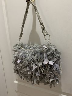 Bling fringe bag,Sparkly fringe bag,elegant fringe bag,fringe evening bag,Wedding handbag,mother of the bride,silver fringe bag BEFORE I start with my description i wanted to let you know I CAN WORK WITH ANY BUDGET. I can build a handbag to FIT ANY BUDGET. Just drop me a line and tell me what you want and i'll let you know what type/size/shape/design handbag i can produce for that amount. I can also do layaway plans with a deposit down PLEASE NOTE: The bag pictured has been sold. I can make anot Glamorous Evening Bags With Tassels, Glamorous Party Bags With Tassels, Evening Shoulder Bag With Beaded Fringe, Elegant Shoulder Bag With Beaded Fringe For Party, Elegant Beaded Fringe Shoulder Bag For Party, Elegant Fringe Bags For Wedding, Elegant Fringed Bags For Wedding, Elegant Party Bag With Beaded Fringe, Elegant Wedding Bag With Tassels