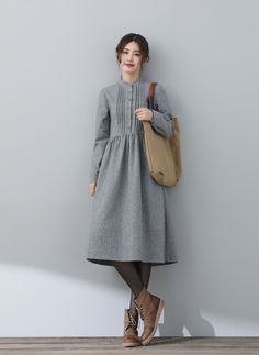 "FEATURES * 25% wool, other fiber,nylon * Polyester lining * Two side seam pockets * Front button closure * Long sleeve wool dress * Casual wool dress * Perfect for winter, autumn * Dry clean * Size XS-Sample is ready to ship, Only 1 available, don't accept refund, exchange * The model is 170 cm (5′ 7″) tall with a 80 cm (31.5\") bust, 66 cm (26\") waist. She is wearing the wool dress in size XS. ★★ Get your size in Size Chart with your body measurement https://www.etsy.com/listing/794055682 ★★ Dress Shirt Dress, Body Measurement, Handmade Dress, Medieval Dress, Dress Handmade, Handmade Dresses, Formal Looks, Wool Dress, Dress With Pockets