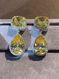 Check out this item in my Etsy shop https://www.etsy.com/listing/1347576603/fancy-yellow-earrings Luxury Yellow Diamond Drop Earrings, Luxury Yellow Diamond Earrings For Wedding, Luxury Yellow Diamond Cut Earrings, Formal Yellow Diamond Cut Earrings, Formal Yellow Diamond Earrings With Diamond Cut, Formal Yellow Diamond Earrings, Yellow Diamond Earrings For Formal Occasions, Elegant Yellow Diamond Earrings, Luxury Yellow Round Diamond Earrings