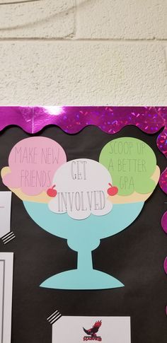 a bulletin board with ice cream cones on it that says make new friends get involved