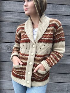 "Vintage 70s cardigan sweater from Miller!  A real stunner, and a very rare find.  Neutral colors, a great collar and hardy plastic buttons in cream with a woven design, no flaws to be found. Acrylic, smooth, warm and very comfortable to wear. Little pockets on the front are so cute! Most cardigans like this are horse/hunting themed, so I was very pleased to discover one that was a bit more versatile. This is a high caliber, collectible vintage piece in near perfect condition. I don't see any si Horse Hunting, 70s Cardigan, Novelty Sweater, Woven Design, Jumpers And Cardigans, Tri Color, Cardigans For Women, Vintage 70s, Neutral Colors