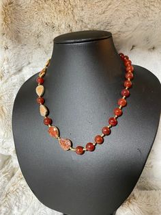 This delicate strand of fire agate gemstones meet Carnelian for a simple, yet elegant statement.  Fire agate is a grounding stone that represents protection, strength and courage. Carnelian is a stabilizing stone that restores courage, vitality and stimulates creativity. Black Labradorite, Gemstone Art, Carnelian Necklace, Fire Agate, Labradorite Beads, Beaded Necklaces, Focal Bead, Agate Gemstone, Fort Worth