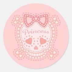 a pink sticker with a skull wearing a bow and the words princess on it