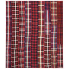 red and white checkered fabric with different colors on it, including one in the middle