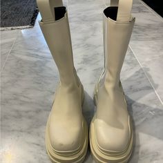 Size 40 Good Condition Beige 100% Authentic Comes With Dust Bag Cream Bottega Boots, Chunky Boots Bottega Veneta, Bottega Veneta Tire Boots, Bottega Veneta Tire Boots Men, Bottega Veneta Shoes, Moto Boots, Bottega Veneta, Dust Bag, Size 10