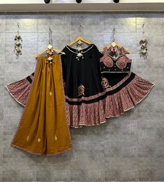 Black Chaniya Choli for Navratri Patola Lehenga 3 pc Readymade garba Lehenga Festival outfit Gamthi Work Garba Night lehenga ready to wear 🌷Lehenga Choli🌷 You get to decide how your Navratri goes. we made that assist decision for you an array of patola Real Hand Work design with gamthi work to make your garba look blend of tradition❣ Top Pattern : Embroidered(Real Hand Work) Lehenga Pattern : Embroidered(Real Hand Work) Lehenga(Stitched) Lehenga Fabric : Rayon Cotton Lehenga Work : Patola Real Hand Work With Gamthi Work Lace Border Pure mal cotton duptta  with foil mirror work  Lehenga Closer : Drawstring With Dori Stitching : Stitched With Canvas and Full Inner Length: 42 Flair : 7 Meter Inner : Micro Cotton Blouse (Stitched) Blouse Fabric : Rayon Cotton (Fully Stitched) Blouse Work : P Anarkali Sets With Dori Work For Navratri, Navratri Sharara With Mirror Work, Fitted Sets With Gota Work For Navratri, Eid Cotton Lehenga With Dupatta, Cotton Cutdana Lehenga For Eid, Cotton Lehenga With Cutdana For Eid, Cotton Sharara With Zari Work For Navratri, Anarkali Cotton Lehenga With Zari Work, Cotton Anarkali Lehenga With Dupatta