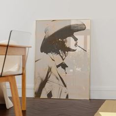 a painting on the wall next to a chair