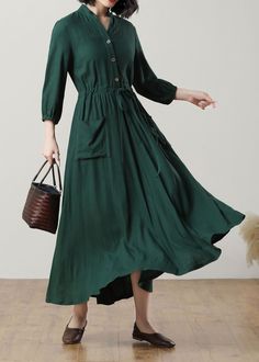 This gorgeous blackish green long-sleeved dress is made of high-quality linen fabric that drapes beautifully on the body. The V-neckline adds a touch of elegance, while the drawstring waist allows you to adjust the fit to your liking. Perfect for any occasion, whether you're going to work or a special event. ★★FEATURES Linen blend fabric Two front pockets Long sleeve Pleated waist details Drawstring waist Front button closure Maxi linen dress Casual linen dress Long linen dress Plus size dress S Dark Green Long Sleeve Midi Dress For Spring, Green Linen Dress Solid Color, Fall Long Sleeve Linen Dress, Elegant Dark Green Long Sleeve Maxi Dress, Long Sleeve Solid Color Linen Dress For Spring, Spring Linen Dress With Long Sleeves In Solid Color, Spring Solid Color Long Sleeve Linen Dress, Green Linen Dresses For Fall, Green Linen Dress For Fall