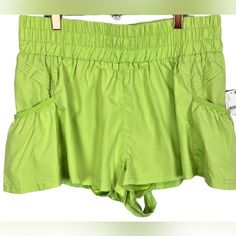 Free Movement Chartreuse Shorts. So Flirty And Fun To Spice Up Your Workout Attire. Flowing Style With A High Rise Smocked Waistband And Side Pockets. Pull On Style Elastic Waistband With Side Pleated Accents With Attached Underline. Perfect For Training, Running Or Any Workout. Nwt. Size L Waist. 16" Across Laying Flat Rise. 12" Inseam. 2" 100% Nylon Machine Wash B14 Spring Green Bottoms With Gathered Waist, White Biker Shorts, Grey Lounge, Free Movement, Training Running, Workout Attire, Basic Shorts, Free People Movement, Lounge Shorts