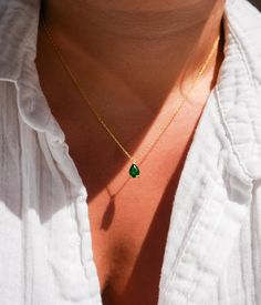 Elevate your elegance with our Emerald Pendant Necklace, featuring a genuine green emerald, perfect for those born in May. This exquisite necklace showcases a tiny teardrop-shaped emerald pendant, set delicately on a dainty chain. Chain Length: 16+2". Key Features: Genuine Green Emerald: Authentic, vibrant green emeralds for a stunning appearance. Teardrop Pendant: A petite pear-shaped emerald adds a touch of grace. May Birthstone: Celebrate your birth month or give a meaningful gift. Dainty Des Emerald Teardrop Gemstone Necklace, Elegant Teardrop Emerald Birthstone Necklace, Pear-shaped Green Emerald Necklaces, Green Pear-shaped Emerald Necklaces, May Birthstone Emerald Drop Necklace, Teardrop Emerald Gemstone Necklace, Green Emerald Teardrop Pendant Necklace, Emerald Drop Necklace For May Birthstone, Teardrop Emerald Necklace As Gift