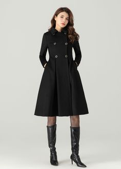 FEATURES 50% wool, 50% wool blend Fully liner with polyester  With pockets Lapel collar  Long sleeve Button closure in front Fitted waist For Winter, Autumn Black wool coat Double breasted wool coat dry clean ★★Mode size Height 170cm (5′ 7″)  Bust 84 cm (33")  Waist 66 cm (26")  She wears size XS. ★★Bespoke Order Service If you Request other color Request the length Your height is not between 155 cm- 175 cm Your weight is not between 47 kg -77 kg I can do it for you, It will need some extra fee depending on on your need. Contact with me for more detail. ★★ Warmly Note: 1 ) : Please confirm your shipping address! If you wish to ship the item to a different address, please send me a message immediately after purchase. We can't change it after shipping, thank you for your understanding. 2 ) : A-line Outerwear With Button Closure, Tailored A-line Outerwear For Winter, Formal A-line Outerwear For Fall, Elegant A-line Outerwear For Work, Formal A-line Fall Outerwear, Single Breasted A-line Outerwear For Work, Chic A-line Wool Coat For Work, Formal Winter Wool Coat With Stand Collar, Double-breasted Wool Coat With Button Cuffs For Office