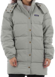 You'll need a solid coat when those cold and rainy days start to arrive and the Patagonia Women's Cotton Down Parka Jacket is the perfect choice. Crafted from 100% cotton, this jacket will keep you warm with recycled down insulation. An oversized and relaxed fit allows for comfort and mobility and is lined with recycled polyester taffeta. A DWR finish will keep you dry while the HeiQ odor control protection keeps your jacket smelling fresh. You'll look good and feel better knowing this parka is Green Cotton Parka For Cold Weather, Patagonia Down With It Parka, Patagonia 3 In 1 Parka, Green Military Cotton Parka, Green Cotton Military Parka, Down Parka, Patagonia Womens, Parka Jacket, Water Resistant Fabric