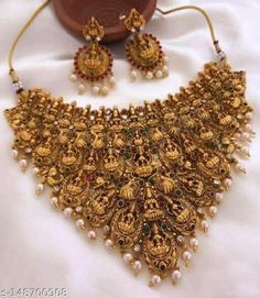 Indian Wedding Jewelry Set! beautiful Laxmi god necklace set with earrings. Plating - Gold Plated Sizing - Adjustable Type - Necklace and earrings  Stone type - Artificial Earrings Artificial Earrings, God Necklace, Matte Gold Necklace, Indian Wedding Jewelry Sets, Jewelry Traditional, Temple Jewelry, Earrings Stone, South Indian Jewelry, Indian Wedding Jewelry