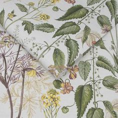 an image of a wallpaper with flowers and plants on it's side,