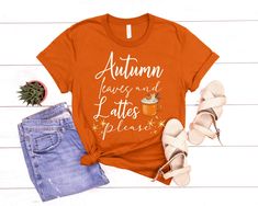 If you are a fan of the fall season and you love all things coffee and lattes, then this Autumn Leaves and Latte shirt is perfect! Pair with leggings or jeans for the ultimate fall look. A go to every day with this top. ♡T-SHIRT * Relaxed fit * 100% Soft cotton * Light fabric for comfort ♡SWEATSHIRT  * Loose fit * 50% Cotton; 50% Polyester * Runs true to size, please check size chart for your perfect fit! Wash: For best results wash inside out on cold and line dry. SHIPPING DETAILS ♡ I will alwa Coffee Colored Tops With Letter Print For Fall, Coffee Letter Print Tops For Fall, Relaxed Fit Coffee Color Tops For Fall, Fall Graphic Tee, Fall Apparel, Autumn Sweater, Clothes Fall, Fall Graphic, Fall Clothes