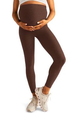 Keep up your yoga practice throughout your pregnancy in stretchy maternity leggings ingeniously designed with a wide, flatlock-seamed Empire waistband. 24 1/2" inseam; 7" leg opening; 14 1/2" front rise; 17" back rise (size Medium) Lined gusset 87% polyester, 13% elastane Machine wash, tumble dry Made in the USA of imported fabric Brown Fitted Activewear For Yoga, High Stretch Brown Activewear For Pilates, Brown High Stretch Activewear For Pilates, Brown Athleisure Activewear For Yoga, High Stretch Brown Yoga Pants For Gym, Brown High Stretch Yoga Pants For Gym, Brown Athleisure Leggings For Yoga, High Stretch Full Length Brown Yoga Pants, Full Length Brown Yoga Activewear