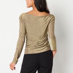 This Worthington women's asymmetrical blouse is a glamorous golden top to make a statement on your next night out. It's made from a stretchy metallic fabric with an asymmetrical neck and long sleeces. Style it with tailored pants or jeans for a chic evening ensemble.Fit: Regular FitNeckline: Asymmetrical NeckSleeve Length: Long SleeveApparel Length: 22 InchesFiber Content: 75% Nylon, 22% Metallic, 3% SpandexFabric Description: RibCare: Tumble Dry, Machine WashCountry of Origin: Imported Gold V-neck Top For Fall, Versatile Long Sleeve Tops For Evening, Versatile Asymmetrical Top For Party, Evening Tops With Asymmetrical Neckline For Fall, Asymmetrical Neckline Tops For Evening In Fall, Asymmetrical Neckline Evening Top For Fall, Gold Long Sleeve Tops For Night Out, Versatile Long Sleeve Party Tops, Elegant Asymmetrical Knit Top