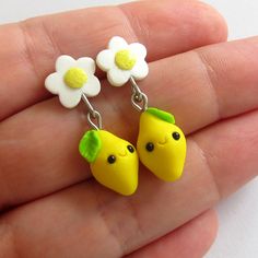 A little pair of bright lemon earrings. A very beautiful piece of handmade jewelry which has been handmade with polymer clay by myself, they are completely adorable! Nice gift for anyone! - Earring hooks and metal elements are stainless steel - Earrings measure 3 cm long  I love to making custom orders! I'll work with you to make something completely unique and exactly how you want it; this includes shape, size and color that you adore. Let me know what you like and I'll do it.  Perfect for uniq Cute Hypoallergenic Polymer Clay Earrings, Yellow Polymer Clay Earrings With Ear Wire, Cute Clay Drop Earrings, Handmade Lemon Color Dangle Jewelry, Cute Polymer Clay Dangle Earrings, Cute Yellow Jewelry With Matching Earrings, Whimsical Yellow Jewelry For Gifts, Handmade Yellow Polymer Clay Earrings, Yellow Polymer Clay Jewelry For Gifts