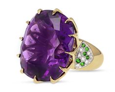 A monumental 51.49-carat amethyst dazzles in this eye-catching cocktail ring. Exhibiting a highly saturated purple hue, the gemstone is set in platinum and 18K gold with diamonds and garnets. Luxury Multicolor Amethyst Ring, Amethyst Cocktail Ring, Purple Cocktails, Ring Guide, Genie Bottle, Jewels Rings, Gem Stone, Jewelry Ring, Perfect Ring