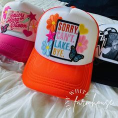 This "Sorry. Can't. Lake. Bye." patch hat is adorable and perfect for anyone who loves a great summer day out on the lake!  This makes the PERFECT gift for the summer, the perfect lake day accessory!  All patches are attached via commercial heat press! Check out my other listings for other options, if you don't see what you are looking for just message me! I love doing custom orders as well to make your dreams a reality! This listing is for the hat only! The hat is a one-size-fits-all snapback style trucker hat that can be adjusted! Please remember that each of my hats is made-to-order, so the size of patches & placement may slightly differ than the hat pictured! It is available as large patch only, whole patch cluster, or whole patch cluster with hat chain! Please see the matching listing Fun Orange Trucker Hat, Cute Beach Hats With Letter Print, Cute Letter Print Hats For The Beach, Cute Cotton Hats For Birthday, Cute Cotton Birthday Hats, Fun Orange Trucker Hat One Size Fits Most, Cute Summer Cotton Trucker Hat, Cute Cotton Trucker Hat For Summer, Cute Snapback Hat With Curved Brim