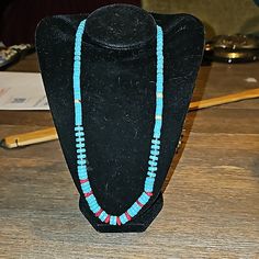 Here Is A Turquoise Dyed Howalite And Real Coral Necklace.. With Silver Toned Beaded Spacers With A Silvertone Toggle Clasp. Dyed Howalite Is Used As A Affordable Alternative To Real Turquoise.. This Is Dyed Howalite.. Which Is A Real Gemstone That Takes And Keeps Color For A Lifetime.. Small Red Coral Accent Beads.. Lays About 18 Inches Long And Is A Stunning Look When Layered.. Do You Want That Coastal Cowboy Look? Well This Is A Super Affordable Way To Achieve That.. Message Me With Any Quest Southwestern Blue Beaded Necklaces For Gift, Southwestern Style Blue Beaded Necklace For Gift, Southwestern Style Blue Beaded Necklace For Beach, Adjustable Blue Turquoise Necklace With Gemstone Beads, Adjustable Blue Turquoise Southwestern Necklace, Southwestern Turquoise Adjustable Necklace, Adjustable Blue Southwestern Necklace, Hand-strung Blue Turquoise Necklace For Jewelry Making, Artisan Blue Turquoise Necklace With Colorful Beads