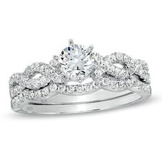 a white gold wedding ring set with diamond accents