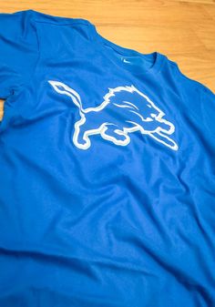 Nike Detroit Lions Blue Essential Logo Short Sleeve T Shirt Chiefs Apparel, Kansas City Chiefs Apparel, Lion Tshirt, Detroit Lions, Short Sleeve T Shirt, Stay Cool, Blue Man, Kansas City, Kansas