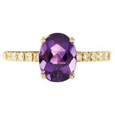 Eliania Rosetti's studio in São Paulo/Brazil designed this elegant solitaire and engagement ring in 3D programming. Its main stone is an oval shaped amethyst measuring 9 x 7mm and 5 diamonds measuring 1.5mm on each side of this stone, totaling 10 diamonds weighing 0.16 carats. The height of the main stone lends elegance to the piece, while the diamonds add value and shine to the set. This ring was produced in Europe/Portugal in 18k GOLD (carats) also known as 750 gold, hallmarked by the Mint and identified with the hallmark of MISSIAN JEWELERY, guaranteeing the use of the noble material described above and whose company is standardized. Amethyst is the birthstone for February, one of the most sought after crystals today and well known for its striking purple color. It's a variety of quartz Sao Paulo Brazil, Jewelry Rings Engagement, In 3d, Ring Verlobung, Purple Color, Hallmark, In The Heights, Birthstone, Engagement Ring