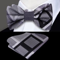 Elevate Sophistication: The Grey and Black Geometric Diamonds Silk Bow Tie A fusion of modern sophistication and timeless elegance, the Grey and Black Geometric Diamonds Silk Bow Tie offers an exquisite statement piece for those seeking refined style with a contemporary edge. Discover the versatility and allure of this accessory, meticulously designed to elevate your ensemble to new heights. Design Elegance: Captivating Geometric Diamonds The bow tie's allure lies in its geometric diamonds patte Black Summer Business Ties, Black Bow Tie For Black Tie Events, Black Summer Formal Ties, Elegant Black Summer Ties, Classic Black Ties, Black Butterfly Knot Bow Tie, Elegant Black Fitted Bow Tie, Elegant Black Ties With Butterfly Knot, Elegant Black Tie With Butterfly Knot