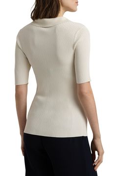 The brand's iconic polo is reimagined as a cardigan knit with ribbed stitches that enhance its slim fit. 24 1/2" length (size Medium) Front button closure Spread collar Short sleeves 78% viscose, 22% nylon Dry clean or machine wash, dry flat Imported Elegant Knit Top With Ribbed Collar For Work, Classic Fine Knit Polo Sweater For Spring, Elegant Fitted Knit Top With Ribbed Collar, Classic Ribbed Knit Top, Chic Textured Knit Polo Sweater For Work, Classic Ribbed Knit Polo Sweater, Classic Knit Polo Sweater With Ribbed Detail, White Ribbed Polo Sweater For Spring, Fitted Ribbed Polo Sweater