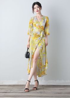 ★★FEATURES polyester fabric wrap dress with string tie on one side v neckline 3/4 length sleeves yellow floral dress with ruffle hemline Perfect for Summer ★★ Bespoke Order Service If you Request other color Request the length Your height is not between 155 cm- 172 cm Your weight is over 75 kg I can do it for you, It will need some extra fee depending on on your need. Contact with me for more detail. ★★ Warmly Note: 1 ) : Please confirm your shipping address! If you wish to ship the item to a di V-neck Wrap Dress With Tie Waist For Garden Party, Chiffon V-neck Maxi Dress With Tie Waist, Summer Chiffon V-neck Dress With Surplice Neckline, Summer Chiffon V-neck Maxi Dress, Spring Floral Print V-neck Chiffon Dress, Yellow Chiffon V-neck Maxi Dress, Elegant Flowy Wrap Dress For Summer, Elegant Flowy Summer Wrap Dress, Elegant Yellow V-neck Dress For Spring