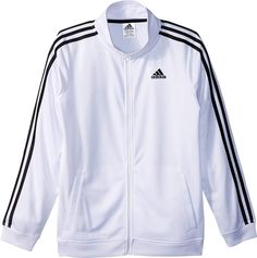 PRICES MAY VARY. The full-zip icon tricot jacket features applied stripes that run down sleeve. Welt pockets, rib sleeve cuff and rib hem Embroidered Adidas brand mark on wearer's left chest.The full-zip icon tricot jacket features applied stripes that run down sleeve. Welt pockets, rib sleeve cuff and rib hem Regular fit is wider at the body, with a straight silhouette Brand Mark, Adidas Brand, Active Jacket, Sleeve Cuff, Welt Pockets, Welt Pocket, Boy's Clothing, Track, Stripes