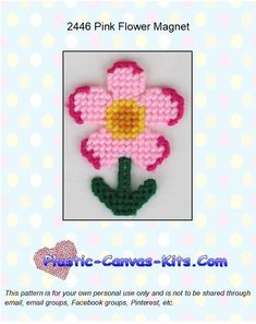 a pink flower with green stems is shown in the middle of an advertisement for plastic canvass