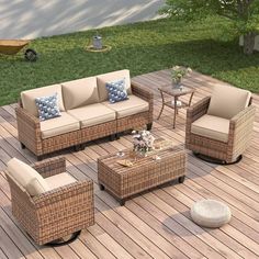 an outdoor furniture set on a wooden deck