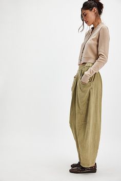 The definition of effortless, these pull-on pants will be your go-to from this season to the next. **Fit:** Mid-rise, tapered barrel silhouette **Features:** Pull-on design, dropped pouch pockets, solid fabrication, ankle-length inseam **Why We ❤ It:** Beachy with simple sandals or toughened-up with moto boots, this pair has endless ways to wear. | High Road Solid Pull-On Barrel Pants by Free People in Green, Size: M Barrel Pants, Simple Sandals, High Road, Cords Pants, Trouser Style, Free People Pants, Moto Boots, Pull On Pants, Small Waist