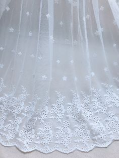 Soft floral embroidery lace fabric by the yard. Perfect for dress making, bridal wear, wedding gown, flower girl dress or curtains. Listing is for ONE YARD. ( Additional quantities are available.) Fabric width approx: 53.1 Inches (135 cm) ..♥ ¸¸..♥ ¸¸..♥ ..♥ ¸¸..♥ ¸¸..♥.. Wholesale acceptable! MORE FABRICS https://www.etsy.com/shop/lacelindsay?section_id=14156869 Feel free to contact me with any questions. To view all our items please click here: .**' http://www.etsy.com/shop/lacelindsay .**' White Embroidered Fabric With Lace Trim For Ceremonies, Ceremony White Dress With Intricate Embroidery, White Embroidered Fabric With Delicate Lace For Ceremony, White Embroidered Lace Fabric For Ceremony, Ceremonial White Embroidered Fabric With Lace Work, White Lace Trim Wedding Dress For Ceremony, White Wedding Dress With Lace Trim For Ceremony, White Tulle Fabric With Intricate Embroidery For Ceremony, White Floral Embroidered Lace For Summer Wedding