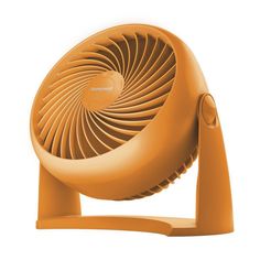 an orange fan sitting on top of a wooden stand