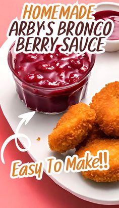 an advertisement for berry sauce on a plate with fried chicken nuggies and cranberry sauce