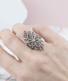 Sterling Silver Lace Long Ring - Artisan Handcrafted Filigree Statement Ring for Women Discover the elegance of our Sterling Silver Lace Long Ring, meticulously handcrafted with intricate filigree artistry. This unique statement ring, featuring a blend of ancient and contemporary design, is perfect for the modern woman who appreciates timeless beauty. Key Features: Length: 1.27 inches Width: 0.62 inches Finish: Oxidized and highly polished for a striking contrast What's Included: Sterling Silver Bohemian Flower Ring With Intricate Design For Gift, Bohemian Sterling Silver Filigree Ring For Wedding, Bohemian Flower Ring With Intricate Design, Fine Jewelry Filigree Open Ring Gift, Sterling Silver Open Filigree Ring With Intricate Design, Gift Filigree Open Ring Fine Jewelry, Bohemian Filigree Open Ring With Intricate Design, Handmade Filigree Open Ring For Wedding, Bohemian Silver Filigree Wedding Ring