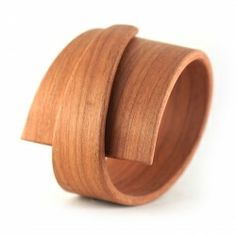 a wooden ring on a white background