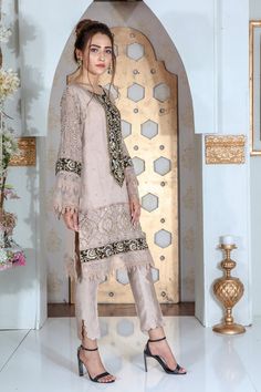 Traditional Hand Embellished Georgette Blouse, Elegant Eid Blouse With Mirror Work, Party Wear Blouse With Mirror Work For Eid, Elegant Semi-stitched Blouse With Dabka Work, Designer Beige Kurta With Mirror Work, Elegant Beige Sets With Mirror Work, Elegant Sequined Kurta For Eid, Elegant Straight Kurta Blouse For Party, Elegant Sequined Kurta