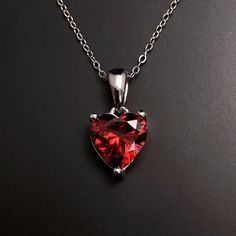 Solid Sterling Silver Garnet birthstone heart pendant, with Sterling Silver 18 inch chain. January Birthstone necklace making the perfect January birthday gift. Matching earrings available here: https://www.etsy.com/listing/1352764891/ Available to order in gold, white gold, rose gold or platinum, please contact me for prices.  💎Pendant thickness: 6mm 💎Pendant width: 9mm 💎Pendant overall Length: 17mm 💎Chain length: 18 inch or other length if required.  ✨ For free giveaways, special offers an Heart Cut Birthstone Jewelry Gift, Gift Heart Cut Gemstone Birthstone Necklace, Heart Cut Gemstone Birthstone Necklace Gift, Sterling Silver Heart Cut Birthstone Necklace For Gift, Red Heart Necklace With Birthstone As Gift, Red Heart Necklace With Birthstone For Gift, Red Heart Birthstone Necklace Gift, Heart Cut Birthstone Necklace As A Gift, Heart Necklace With Gemstone For Gifts