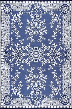 a blue and white bandanna with an intricate design