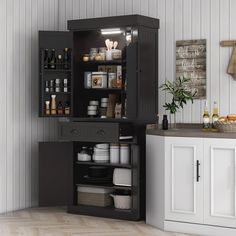 an open cabinet in the corner of a kitchen