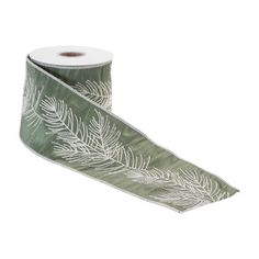 a roll of green ribbon with white leaves on it